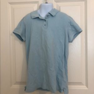 A blue boys button up shirt